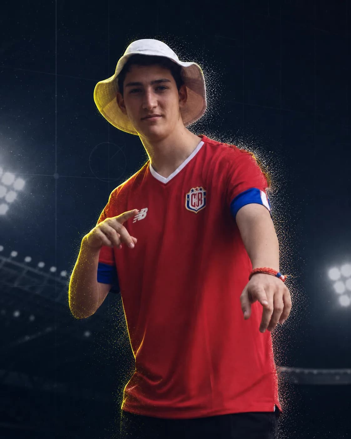 Adi Rosenstock wearing a red Club Sport Cartaginés shirt